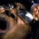 An Obama supporter listens at a campaign rally in College Park, Md.